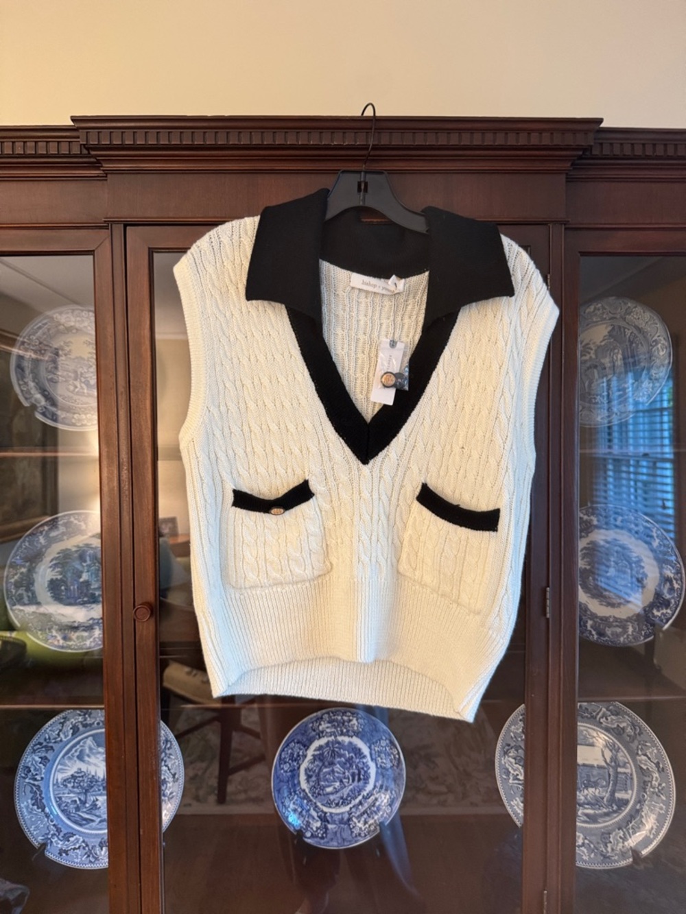 bishop + young Cream Cable-Knit V-Neck Sweater Vest with Black Trim